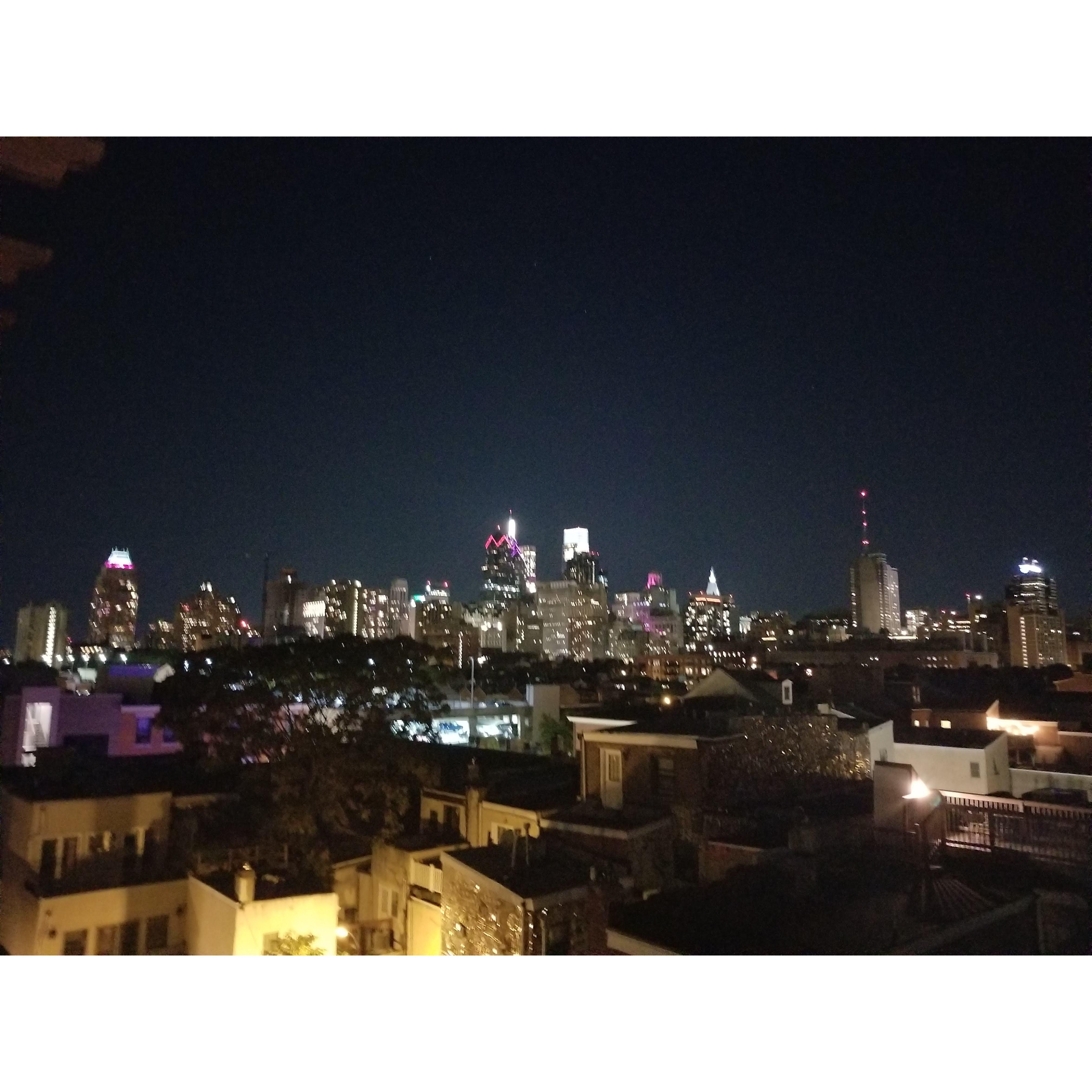Kate captured the Philly skyline Oct '20 at Travis's COVID-friendly rooftop party. Rekindling the spark between them.