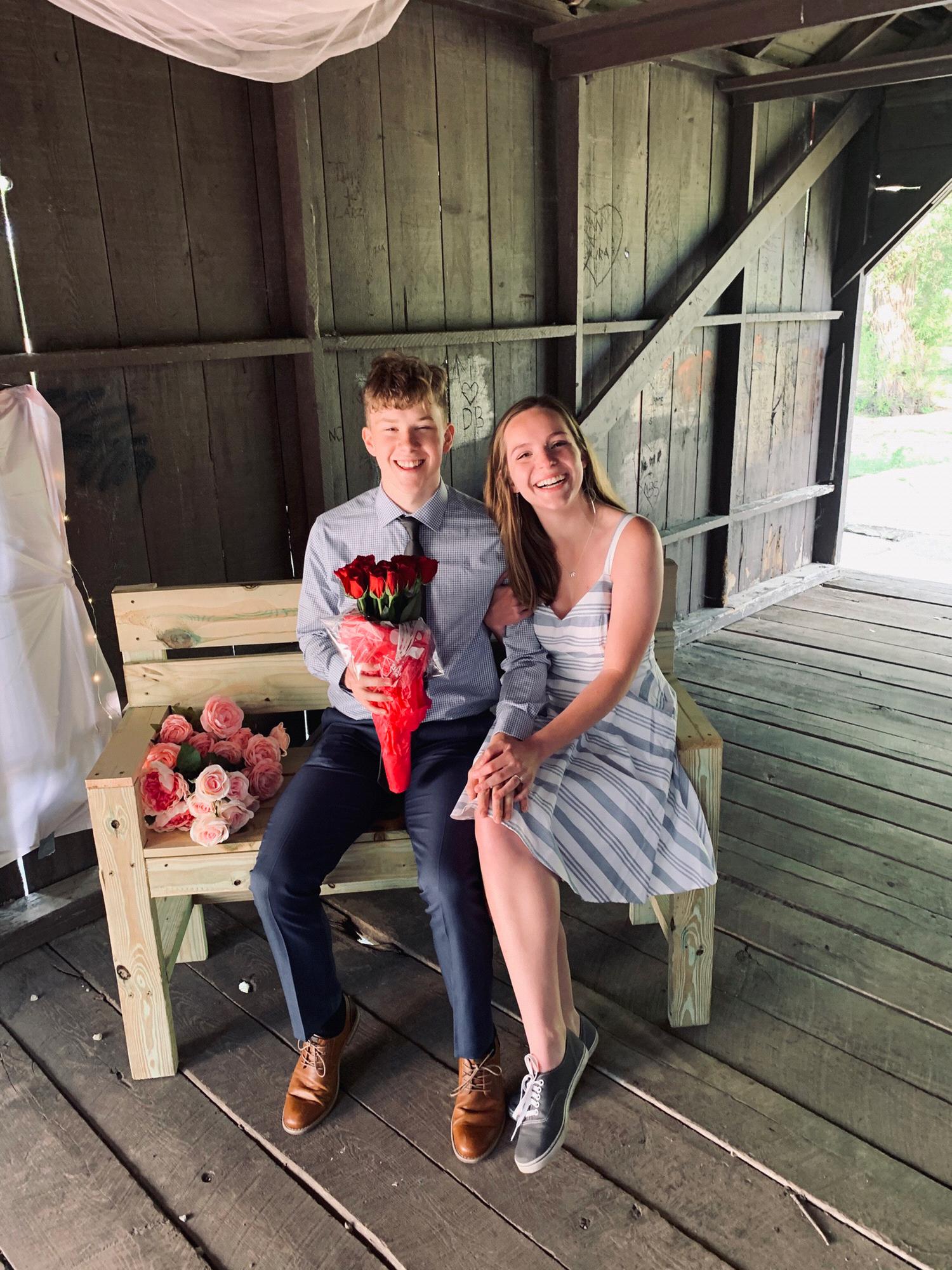 Our sweet proposal! Asa made the bench and Faith dumped the camera into the river running under the bridge! Our little covered red bridge in Asa's hometown, Mantorville. Summer 2020.