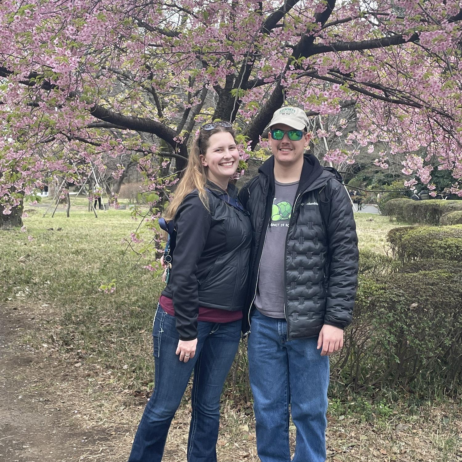 Us in front of the cherry blossoms at The Imperial Palace in Japan.