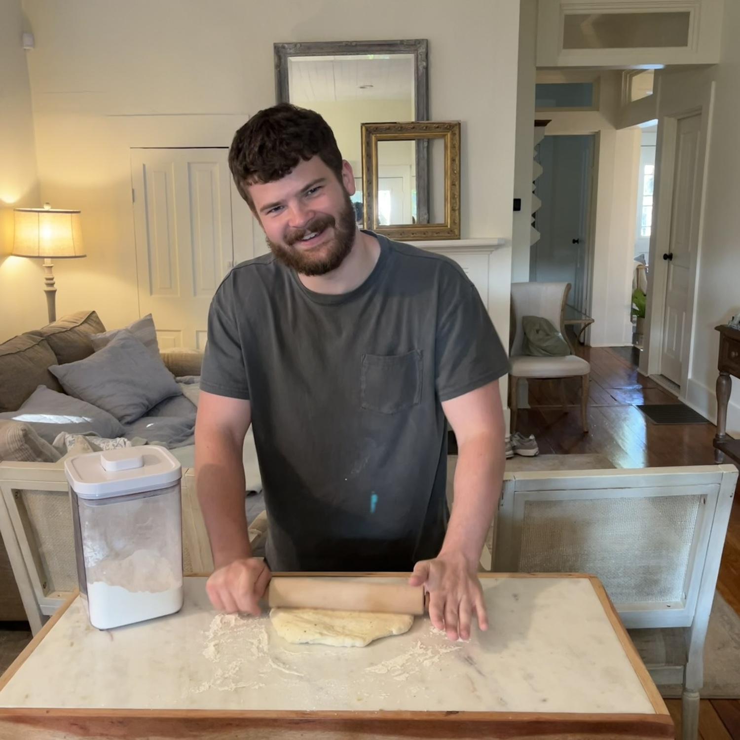 Many of our date nights include cooking at home and listening to a record! Here's a rare photo of Timothy cooking!