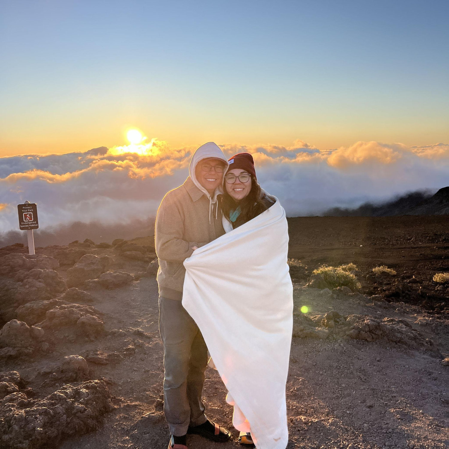 Morning sunrise above the clouds from the summit of Haleakalā - Maui, Hawaii.