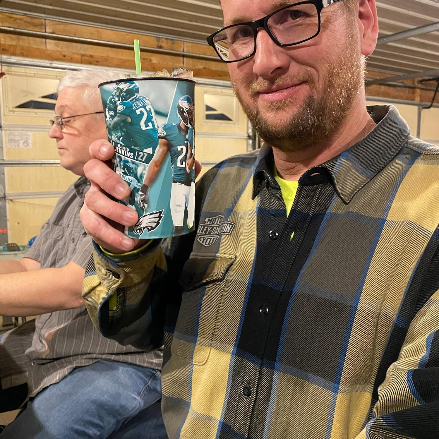 Clark using an Eagles cup.