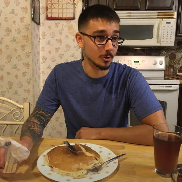 First pancakes shared together. *"Sunday Morning" plays in the background*