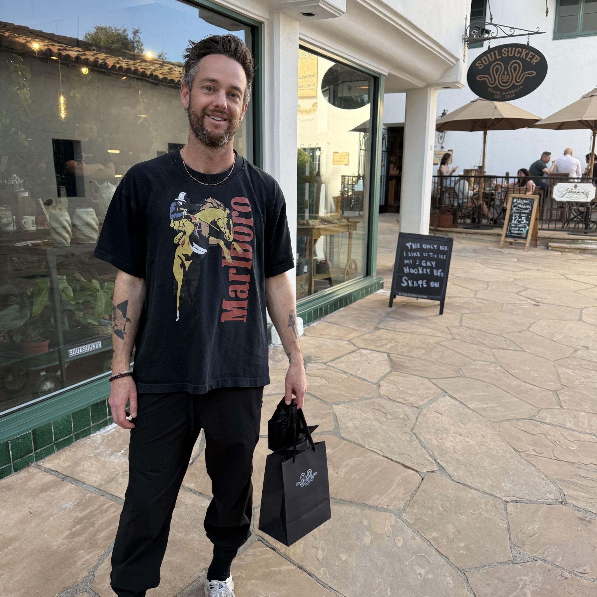 This could be you, coming home with fabulous new art... located in the El Paseo Restaurant plaza