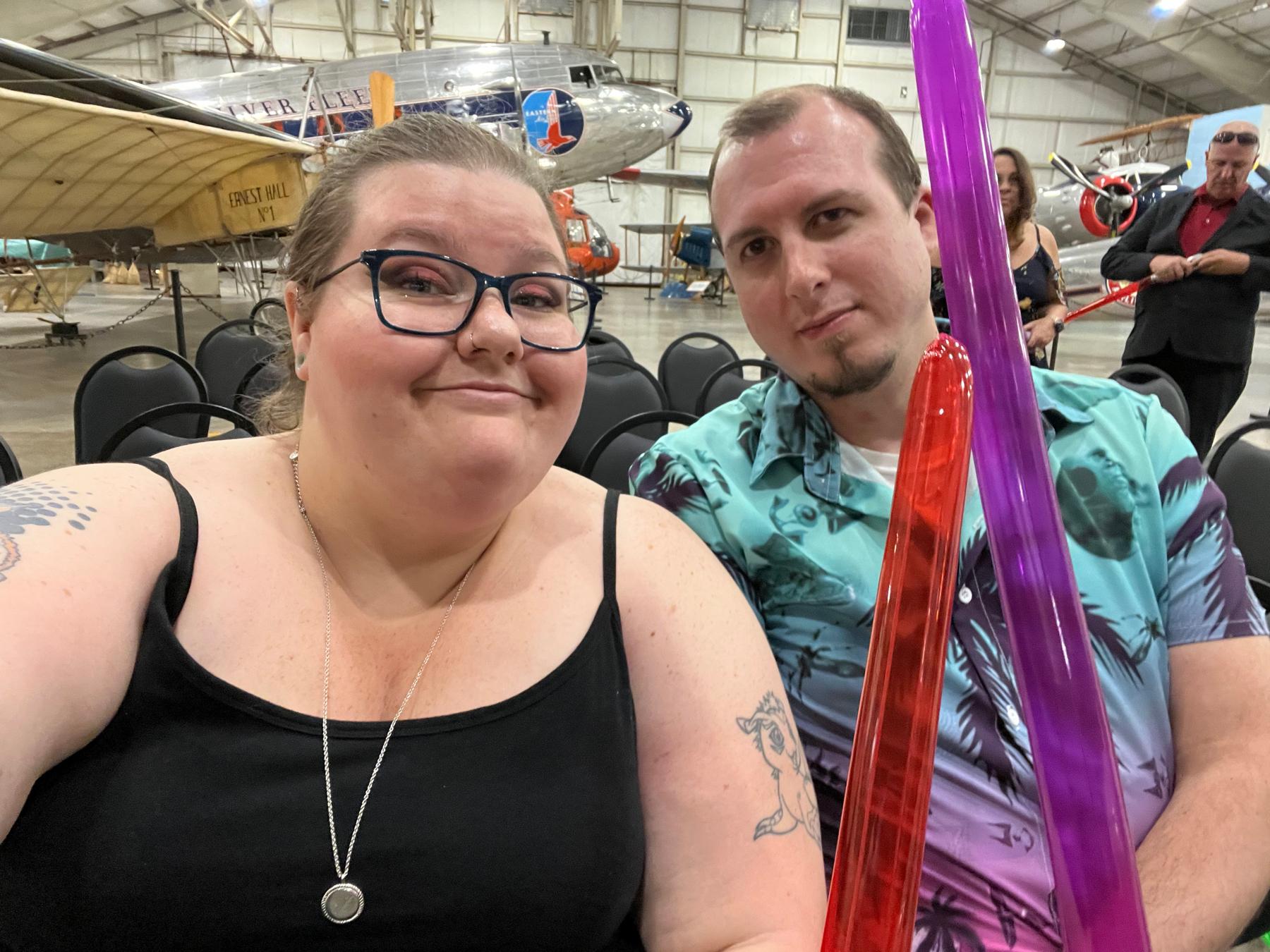 It was a Star Wars wedding, hence his Star Wars shirt and the inflatable lightsabers