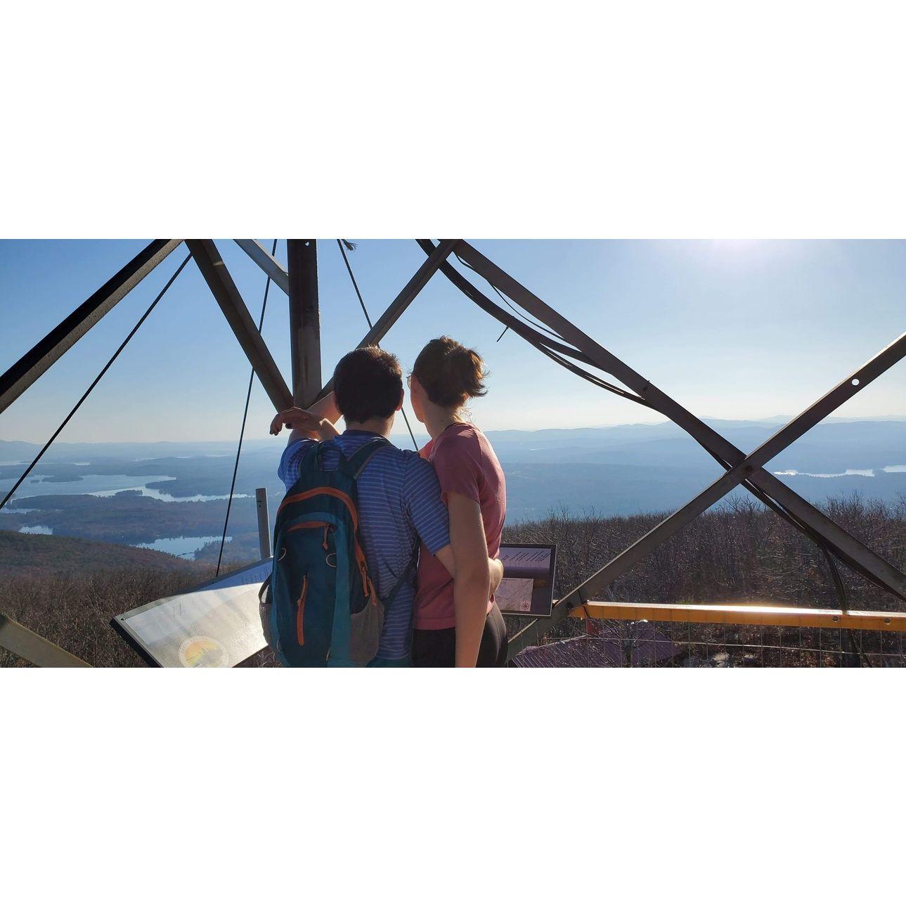 November 2020. Atop the fire tower on Red Hill where we got engaged (4 years later!).