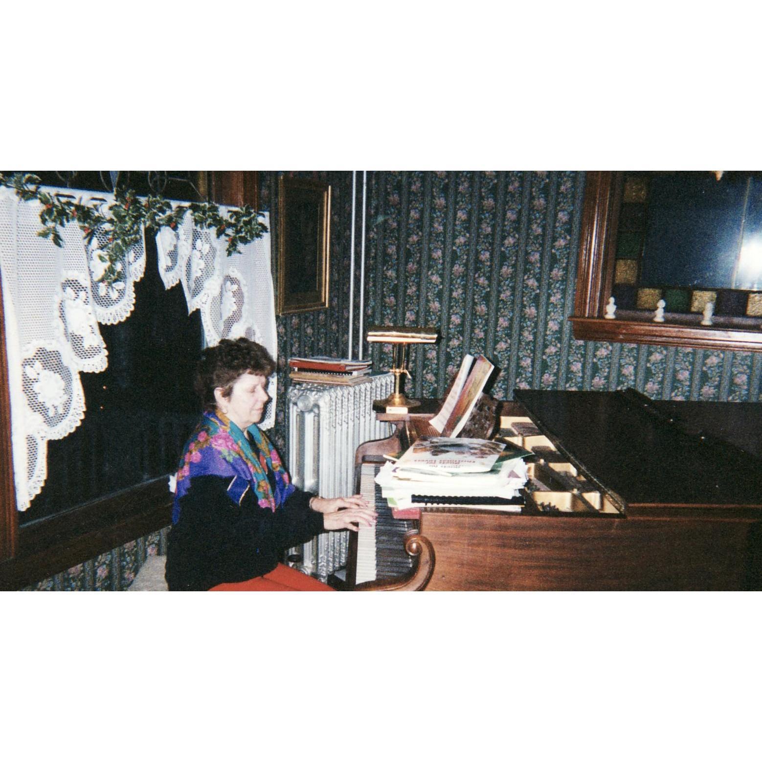 Ashley's Grama Phyllis O'Brien passed away in 2007. She was a wonderful musician and is seen here delighting everyone at Ashley's piano.
