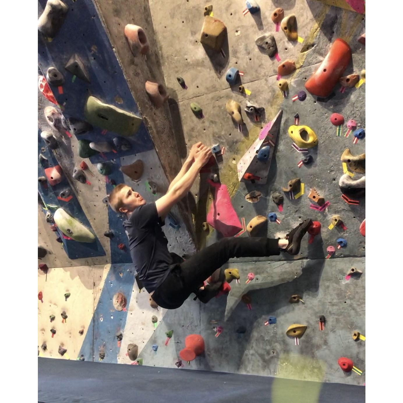 Peter rock climbing