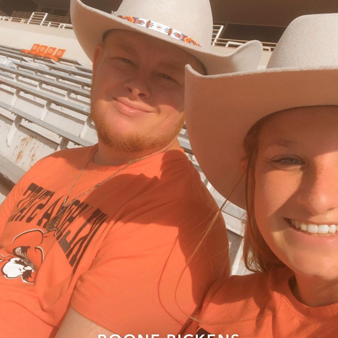 A RARE sight, Dalton wearing an OSU shirt when we went and watched them play football while I was attending school there.