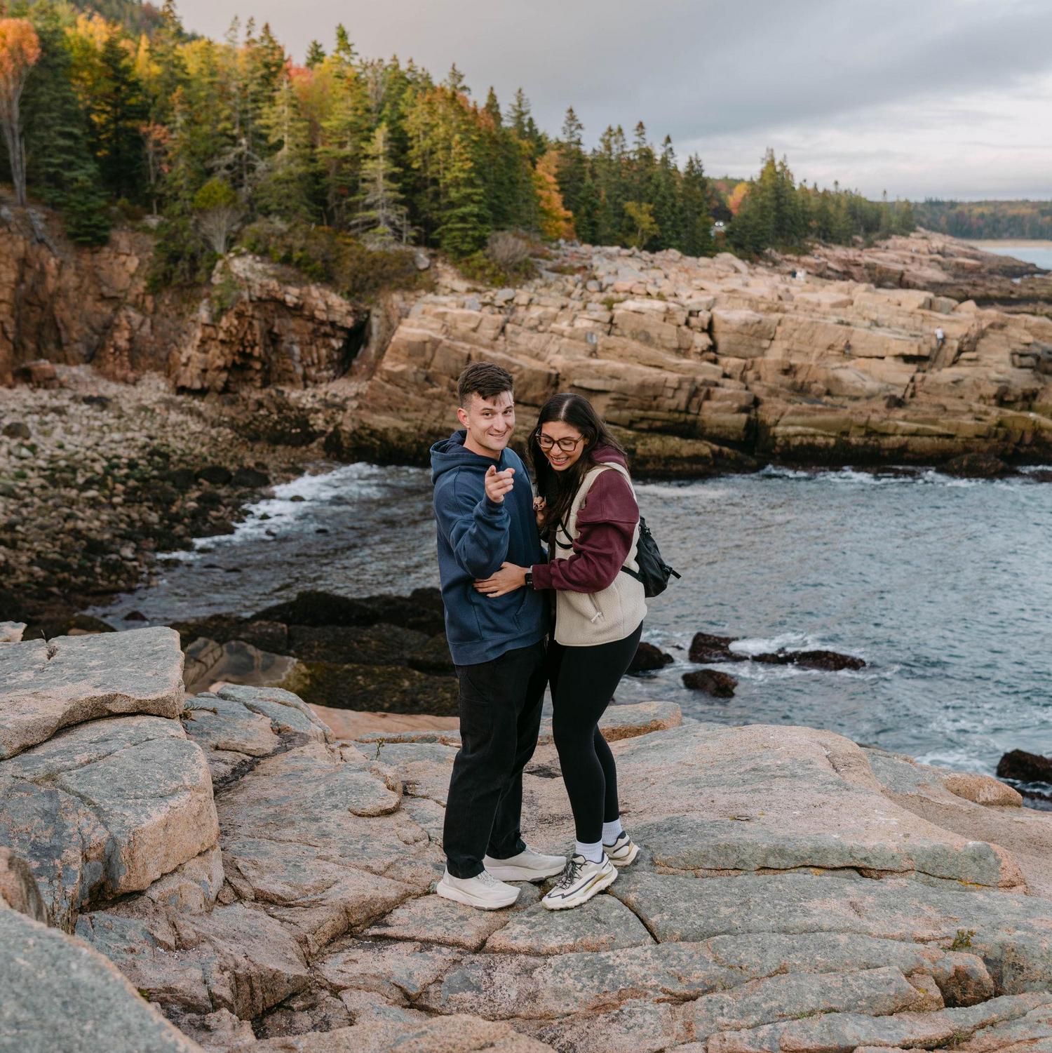 Jake revealing the hidden photographer he hired to capture our engagement