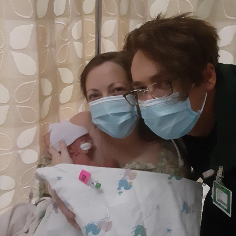 Our first photo as a family with our new baby girl!