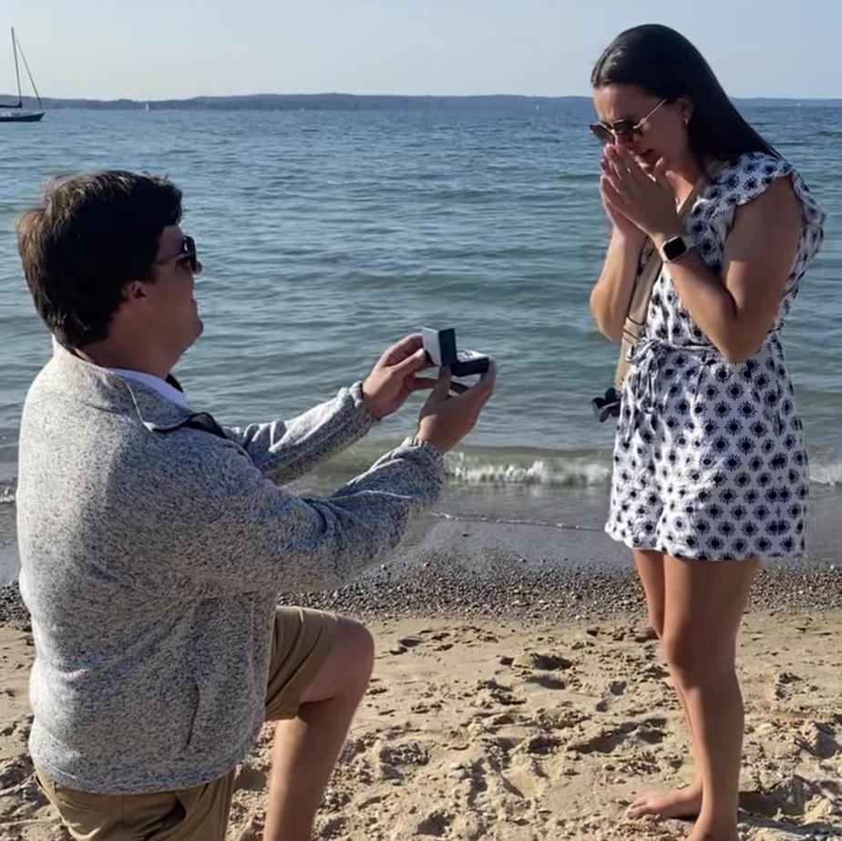 Myles proposed in Traverse City at sunset on 8/26/22!