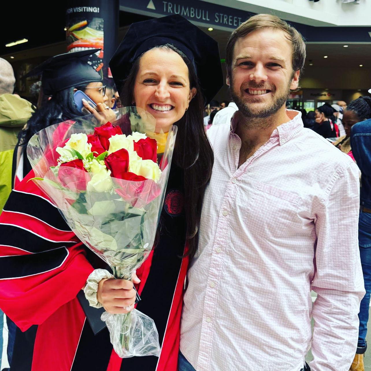 Abby's Doctoral Graduation! Cam, abby's #1 fan- celebrating and supporting right by her side, just as he did throughout the long journey --> Dr. Reed! also that bouquet?! he's just showing off