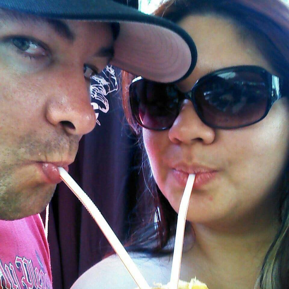 Sharing a coconut in Hawaii 2013