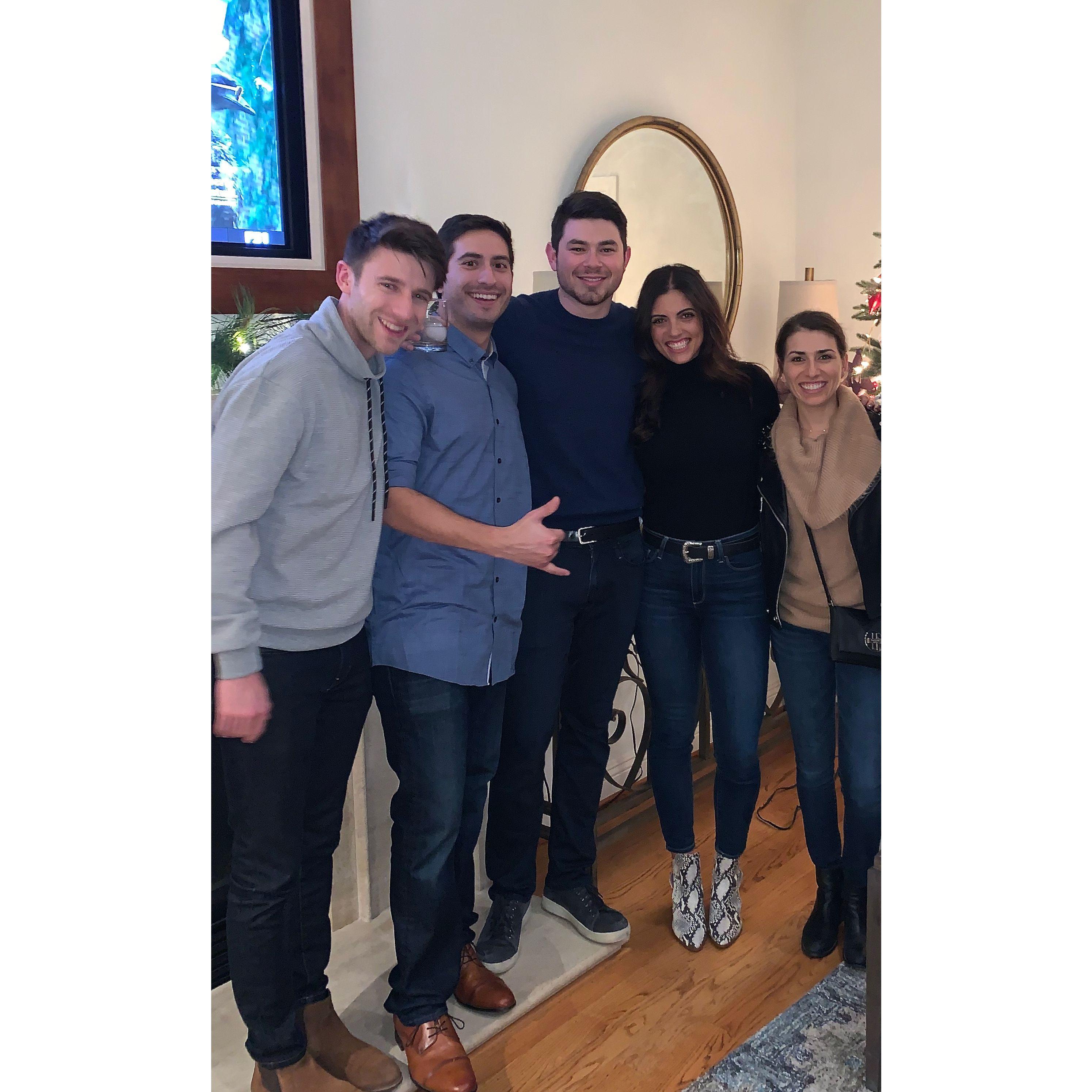 This is a photo with friends at the holiday party where Brandon and Maddie first met. 