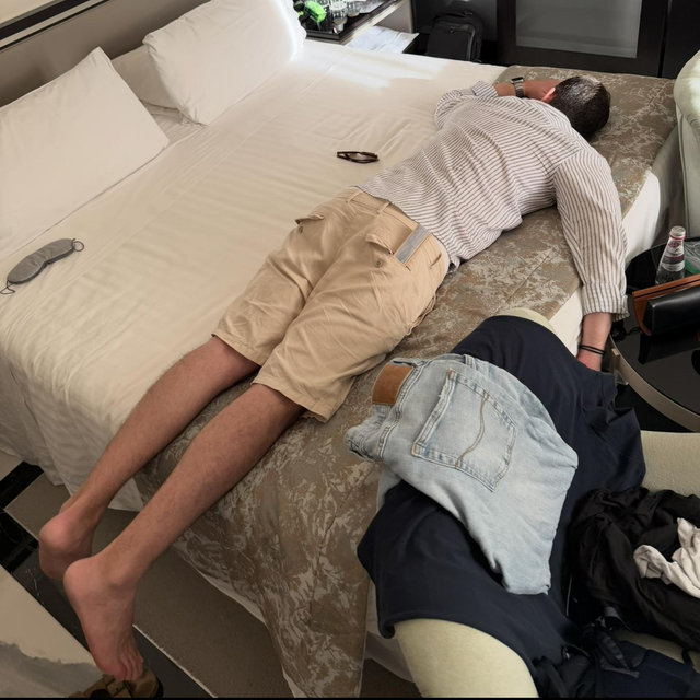 Hotel room upgrade so Andrés can sleep horizontally across an entire king-size bed.