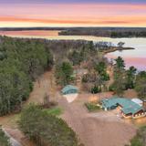 KNOTTY PINES ON CLAM LAKE