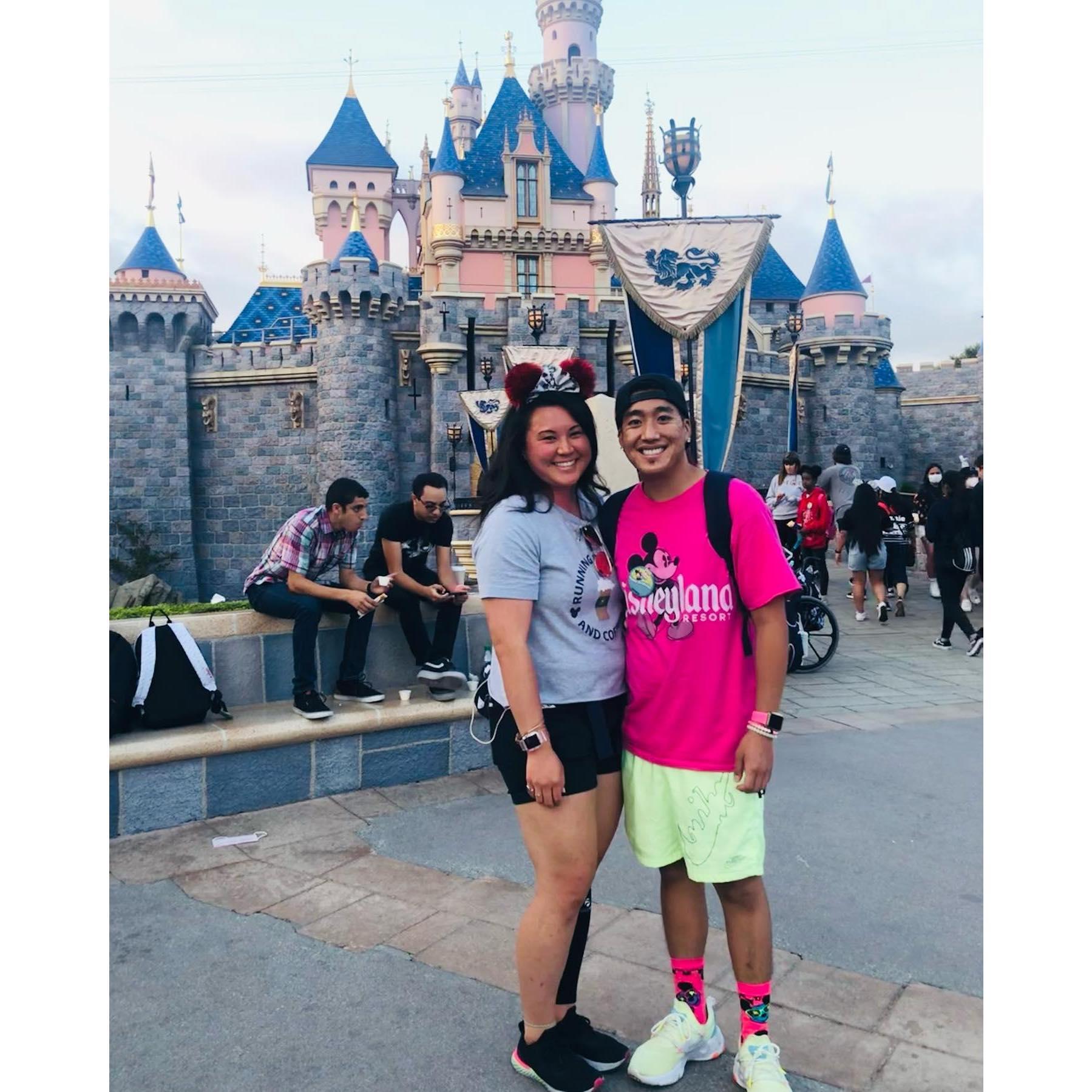 Brian and Kelsi in Disneyland in front of Sleeping Beauty's Castle