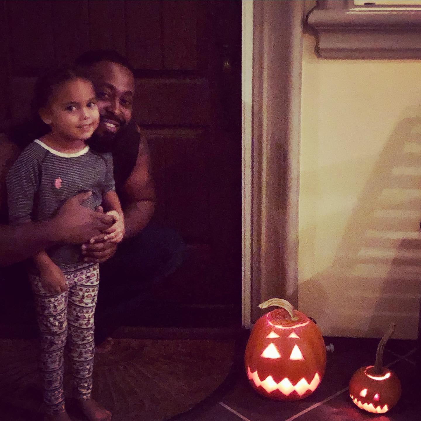It's FALL and SJ carved her first pumpkin with Daddy's help.