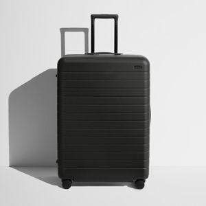 Shop Large & Checked Suitcases in Jet Black | Away