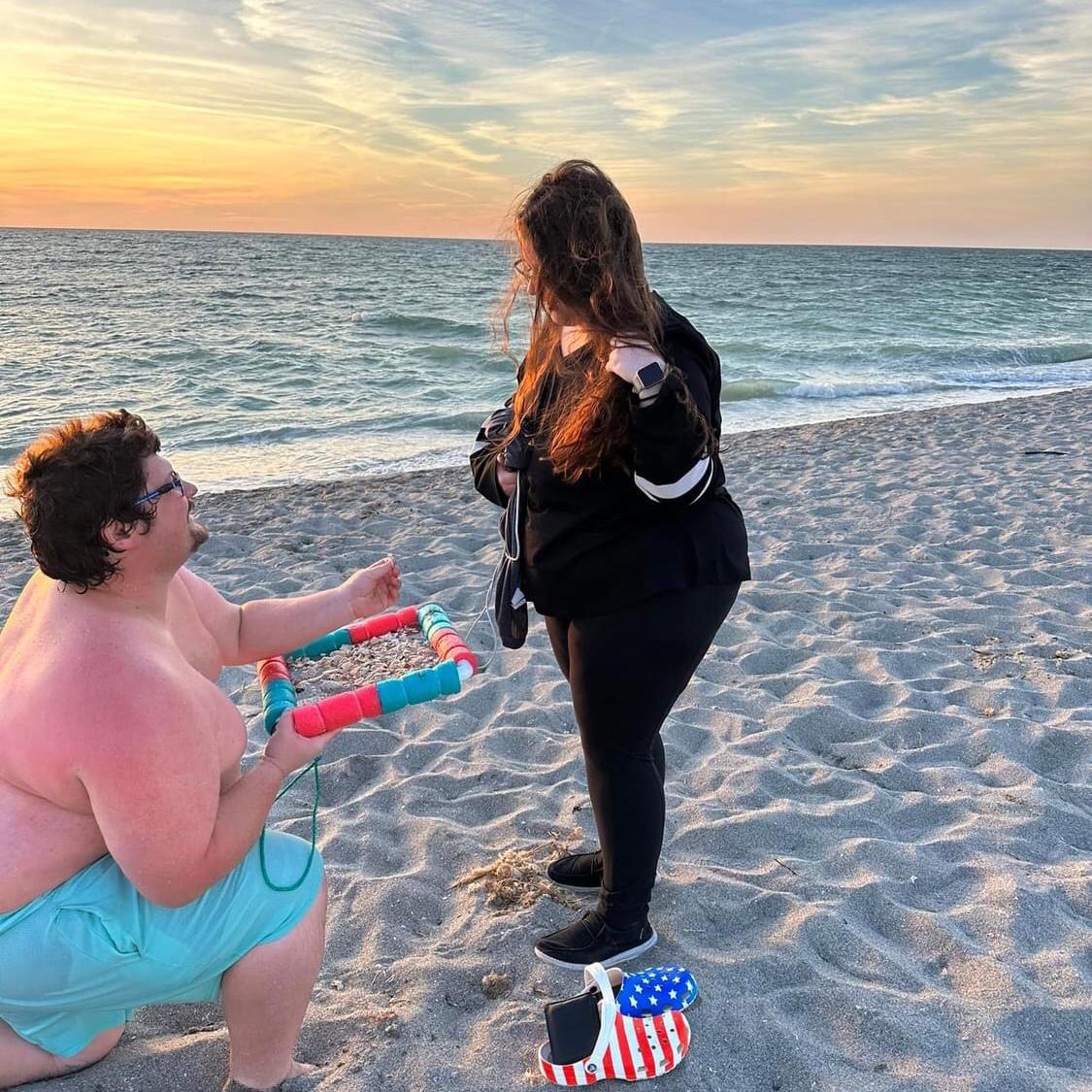 Zach proposing in Venice Beach, Florida