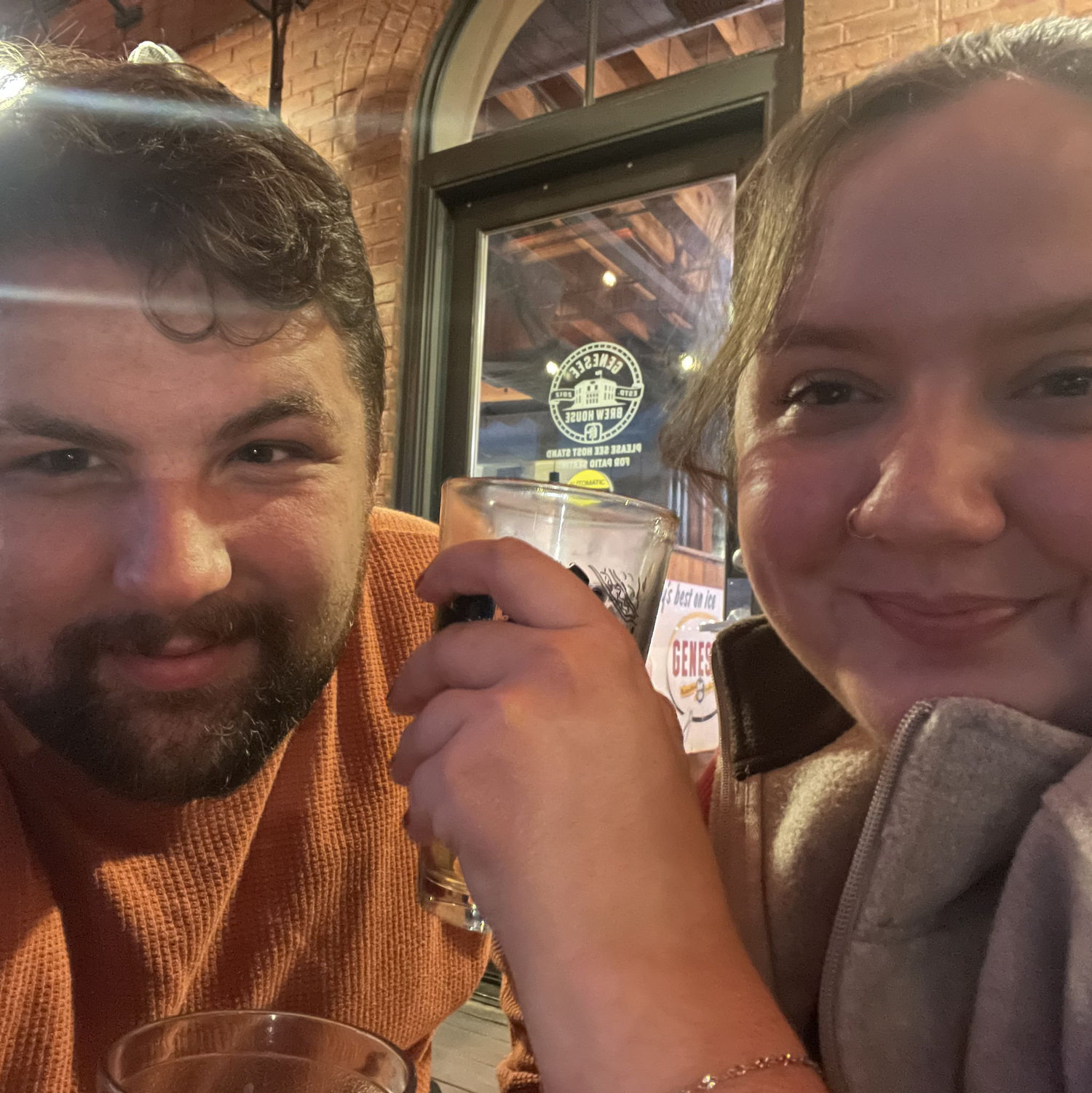 Genesee Brewhouse in Rochester, Sydney loves the pesto chicken sandwich, and Cam enjoys the Grilled Cheese with Tomato Bisque
