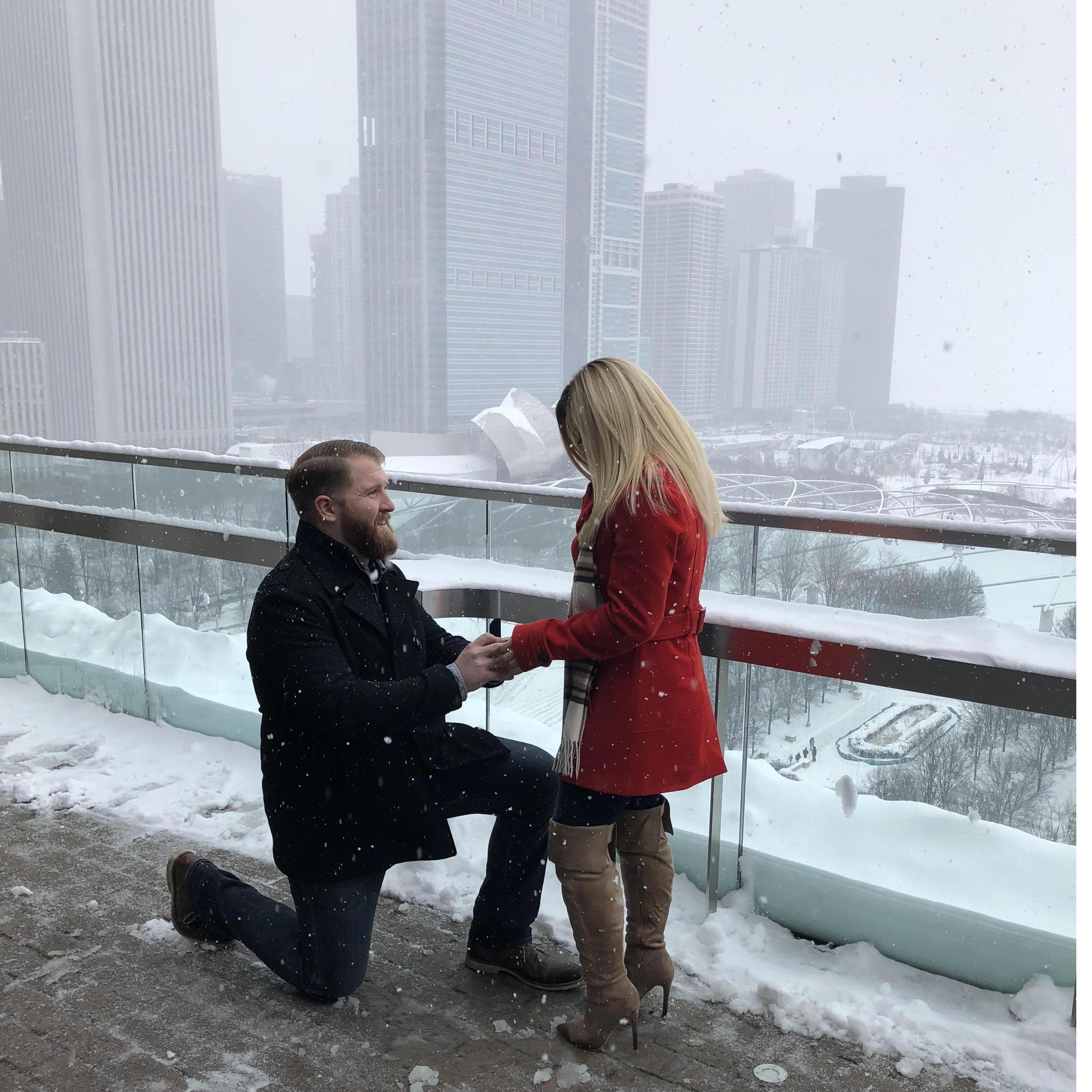 Ben proposed on February 9, 2018 on top of Cindy's Rooftop overlooking the scenic Chicago skyline.