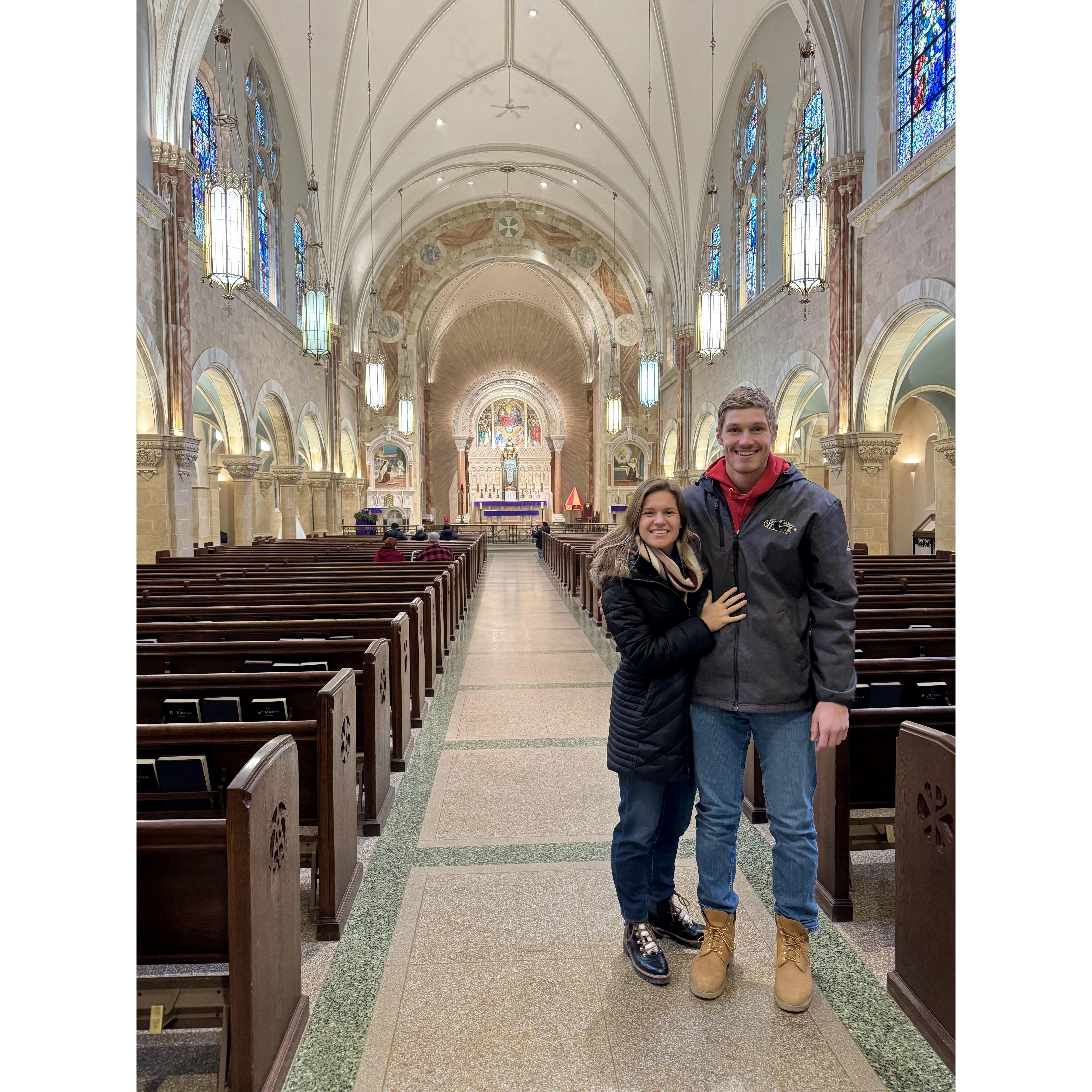 Attending Mass one year after our first date at Holy Hill before snowboarding