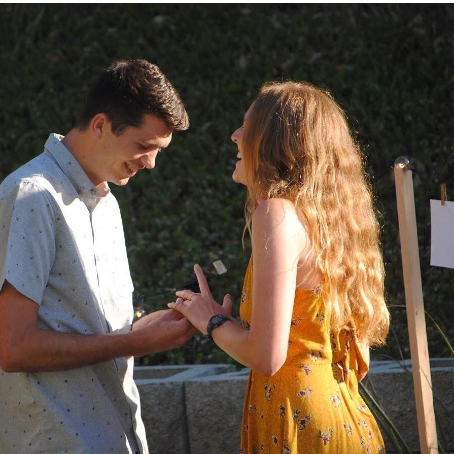 this photo is the best... Eric kept trying to put the ring on Nadine's right hand
