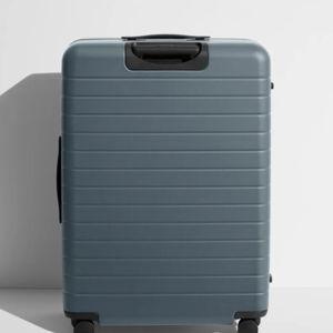 Shop Large & Checked Suitcases in Coast Blue | Away