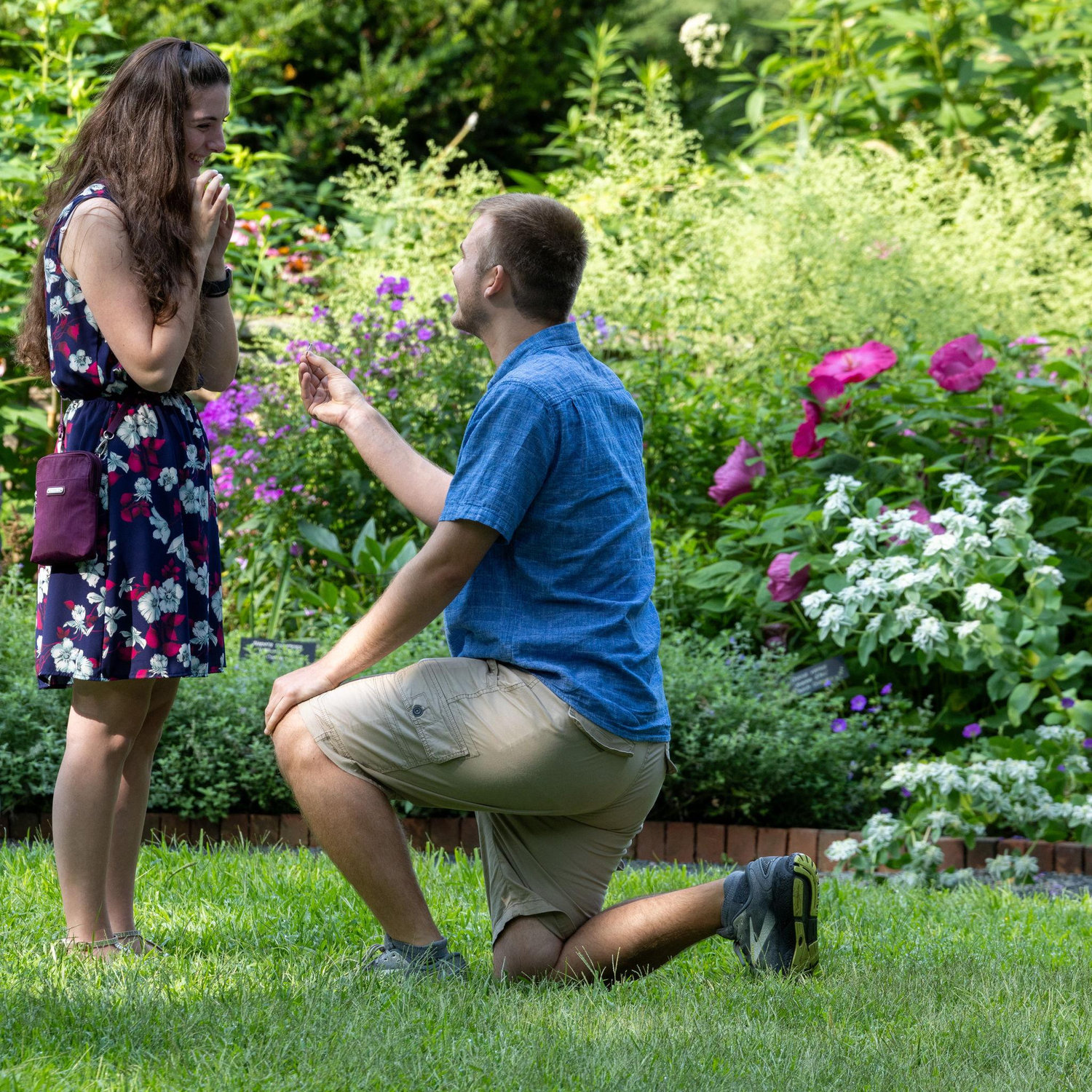 A candid moment from a photographer who happened to be in the same place as us when John proposed (unplanned!)