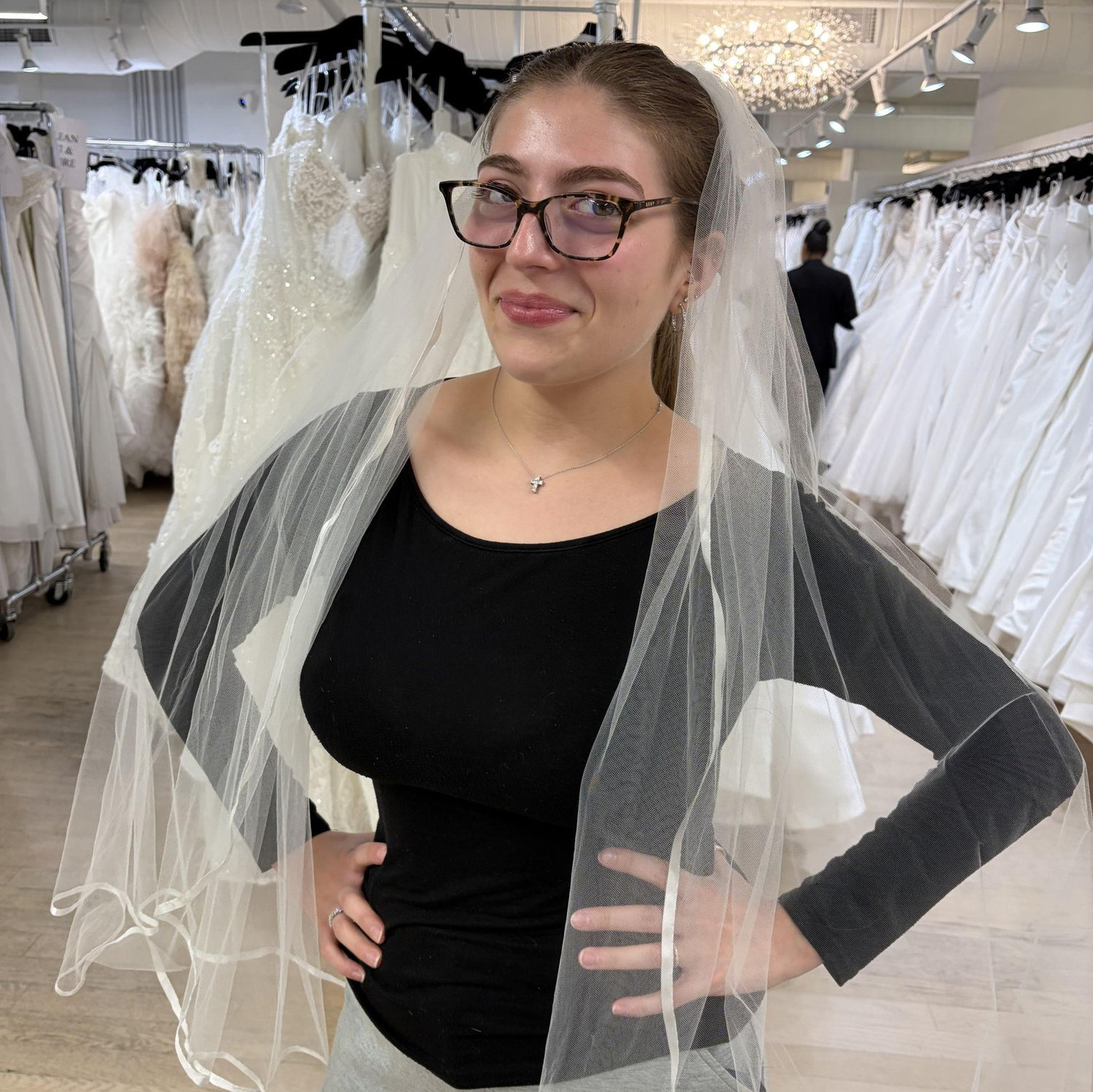 Julia "helping" Danielle dress shop