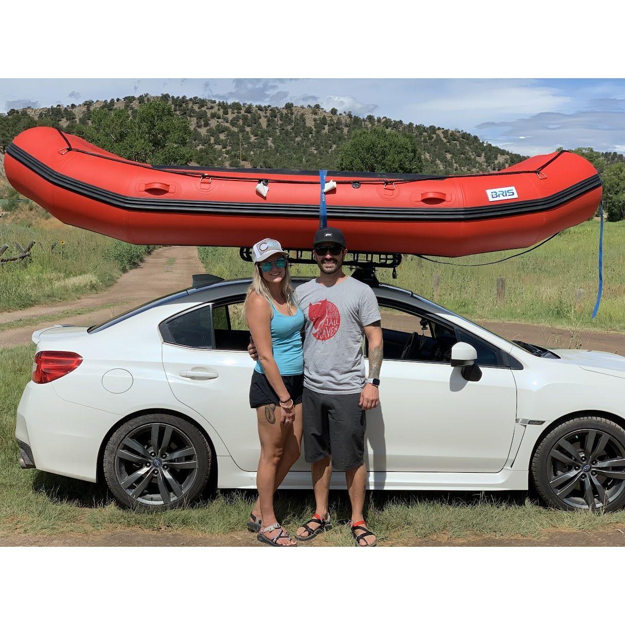 Right before rafting, with the raft on Brittany's Subaru WRX....