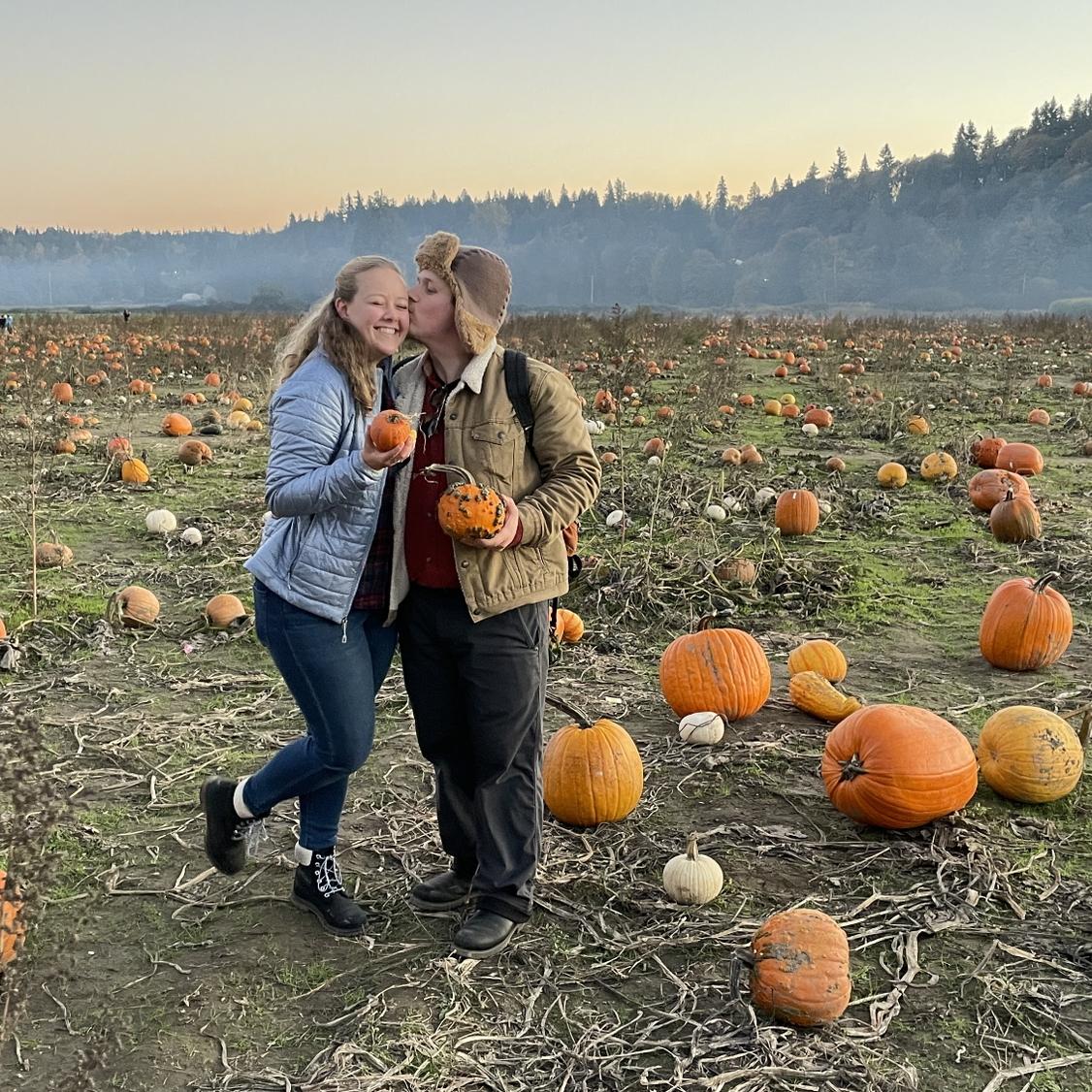 Bob's Pumpkin Patch with friends. Katie found the tiniest pumpkin.