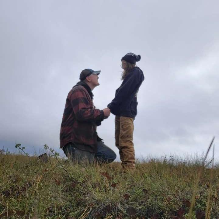 Our Engagement! In the mountains of Eureka Alaska. Surrounded by a field of blueberries! Who could ask for more?