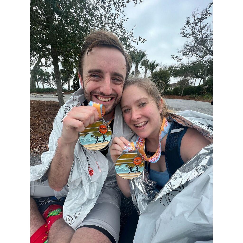 Right after crossing the finish line of our first marathon (Kiawah Island, SC).