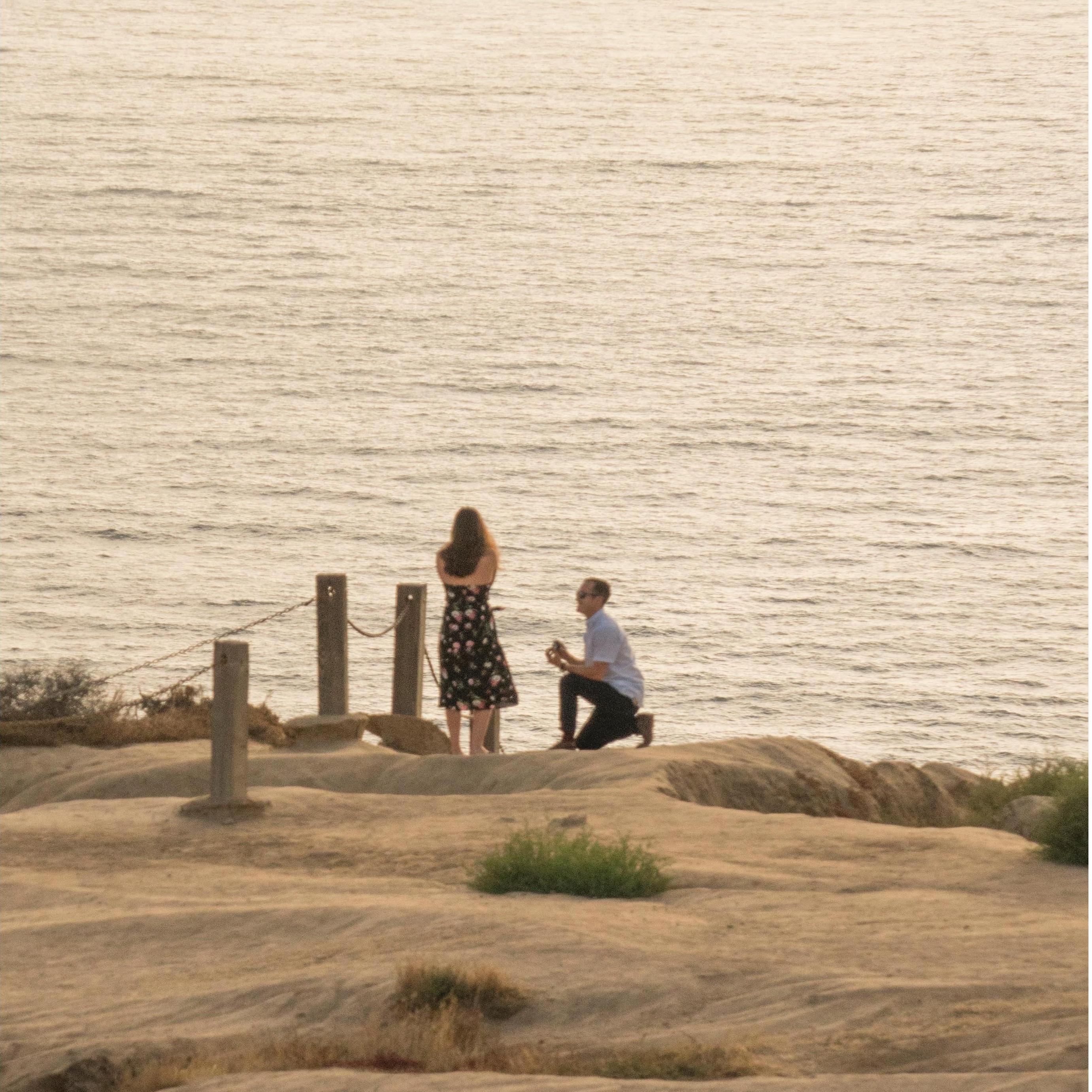 A sneaky photo by Chris (Olivia's brother) of Jake popping the question!