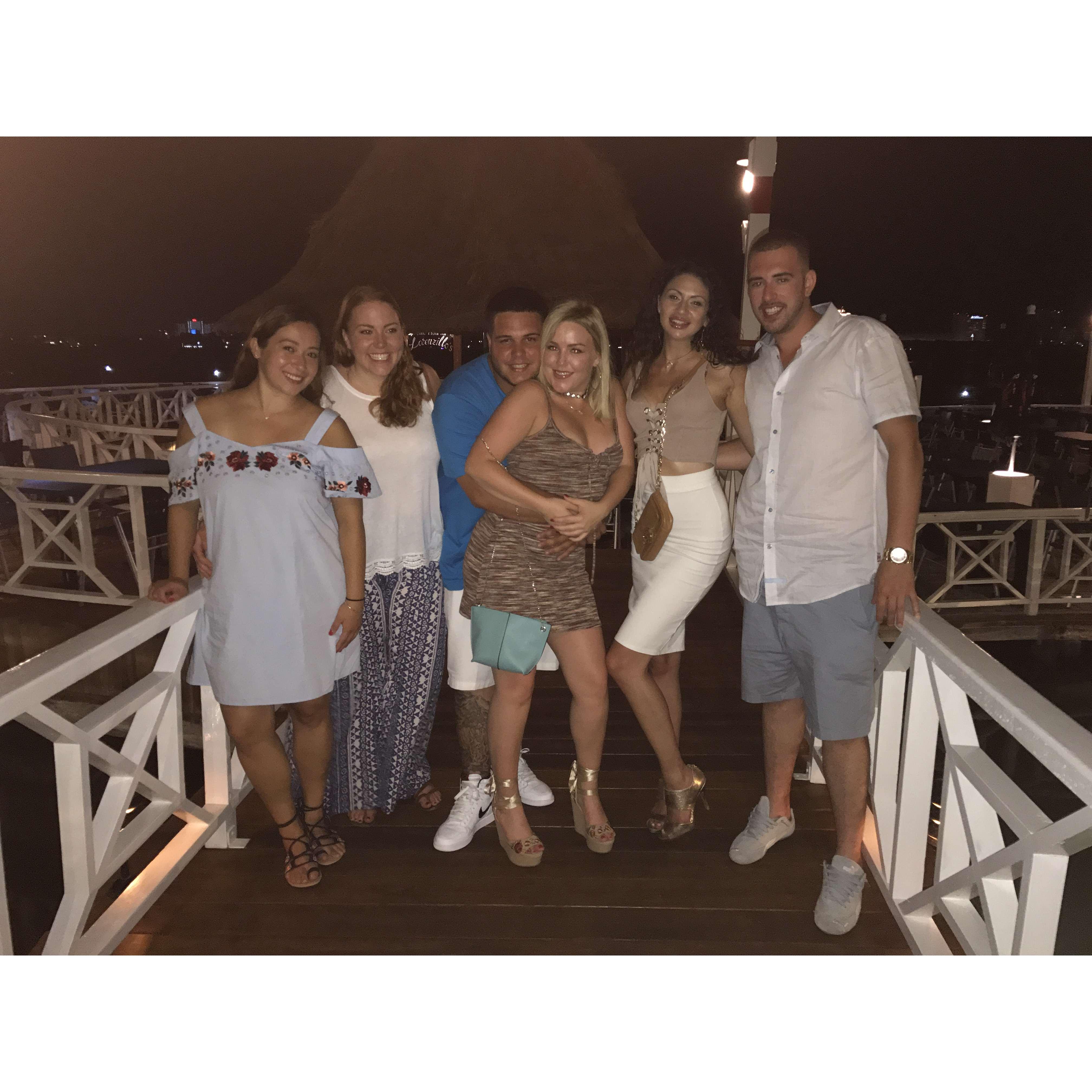 August 2016: After feeding alligators at dinner in Cancun with family & friends. Shirley, Alexa, Vinny, Marie-Elena, Alexa & Joey,