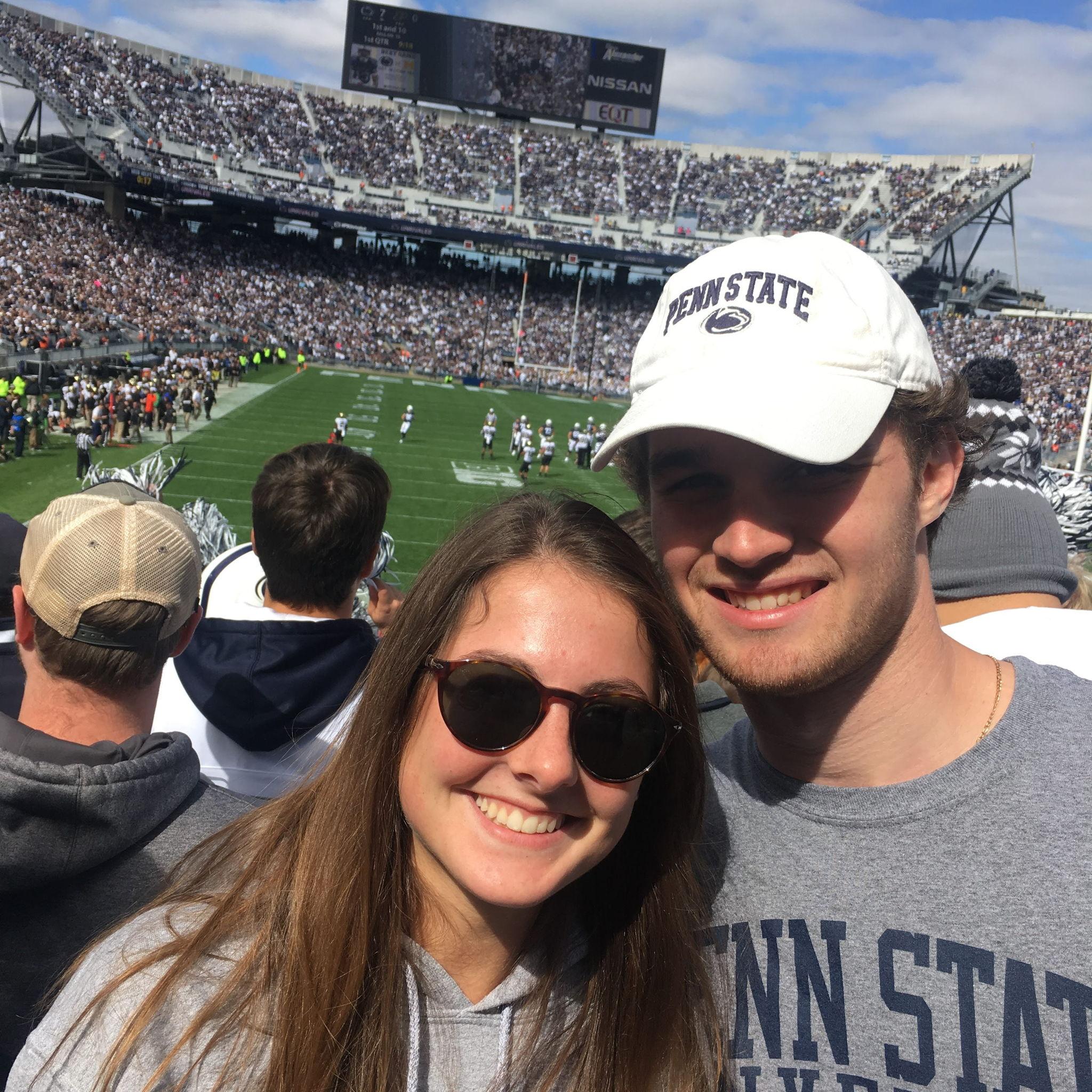 Diana treating Eamon to a PSU football game