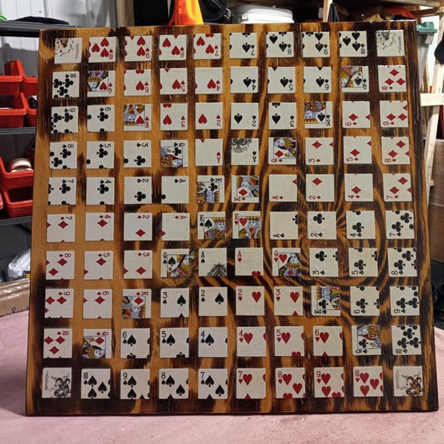 Handmade 24 Inch Square Wood Burned Square Game Board to play the game of sequence. 16 layers of polyurethane and lacquer.