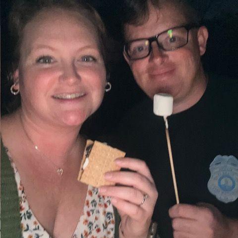 Enjoying smores by the fire at our house.