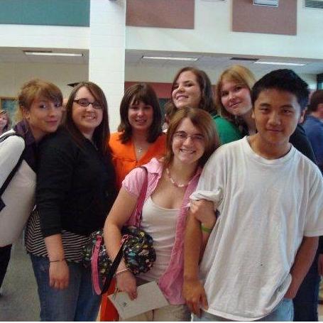 Senior year of high school, Leng trying not to be in a picture, and me holding him against his will.