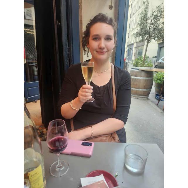 The french waitstaff were kind enough to gift champagne to the newly engaged couple. five minutes later she started harassing every Parisian hostess for creme brulee on the streets of Paris