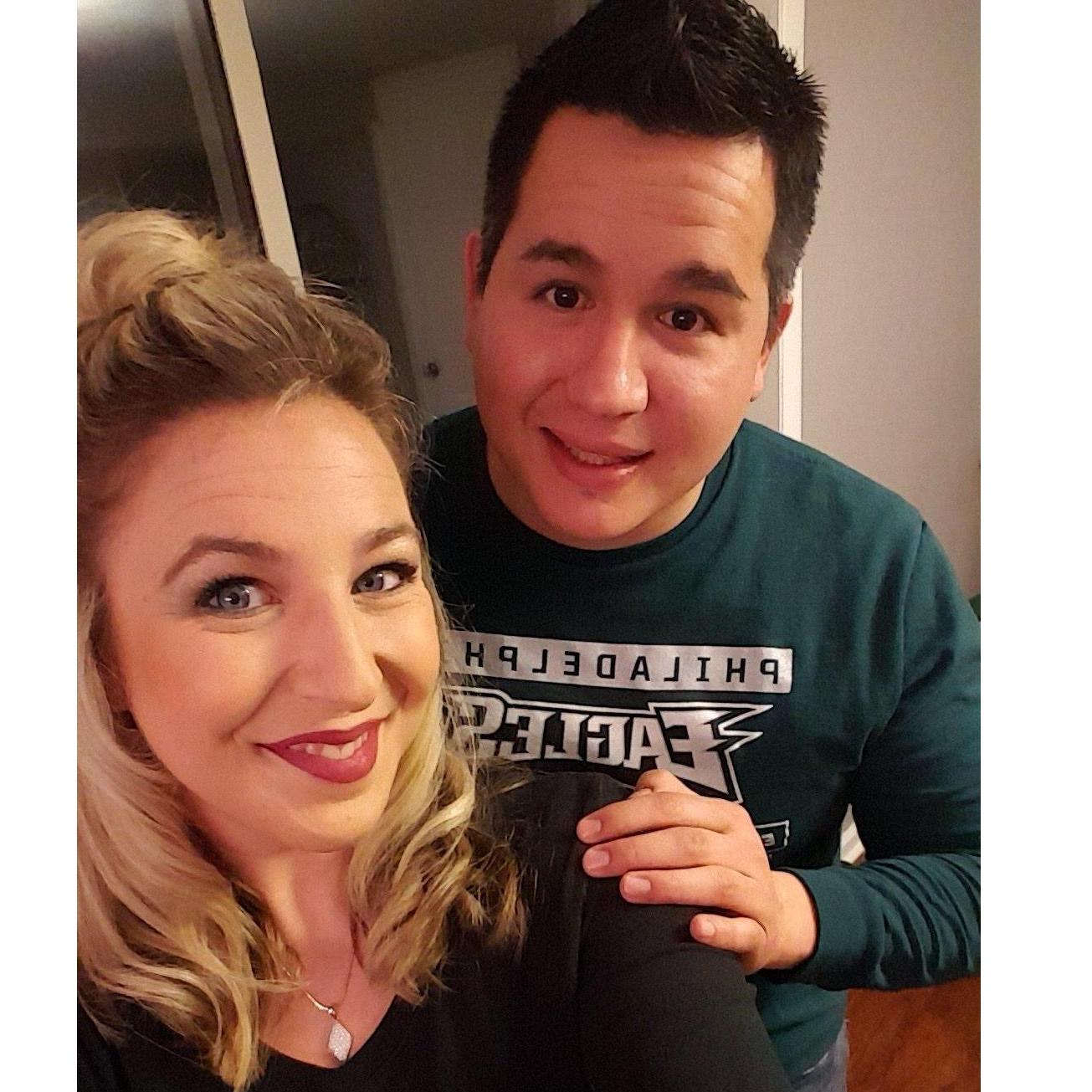Super Bowl...look at him supporting her team!