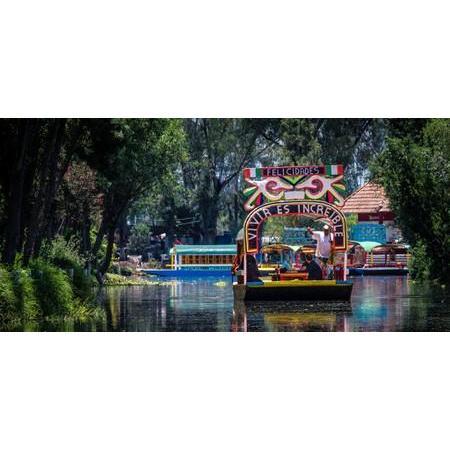 Las trajineras de Xochimilco. This is one of the most historic areas of Mexico City with the last of the floating gardens built by the Aztecs.