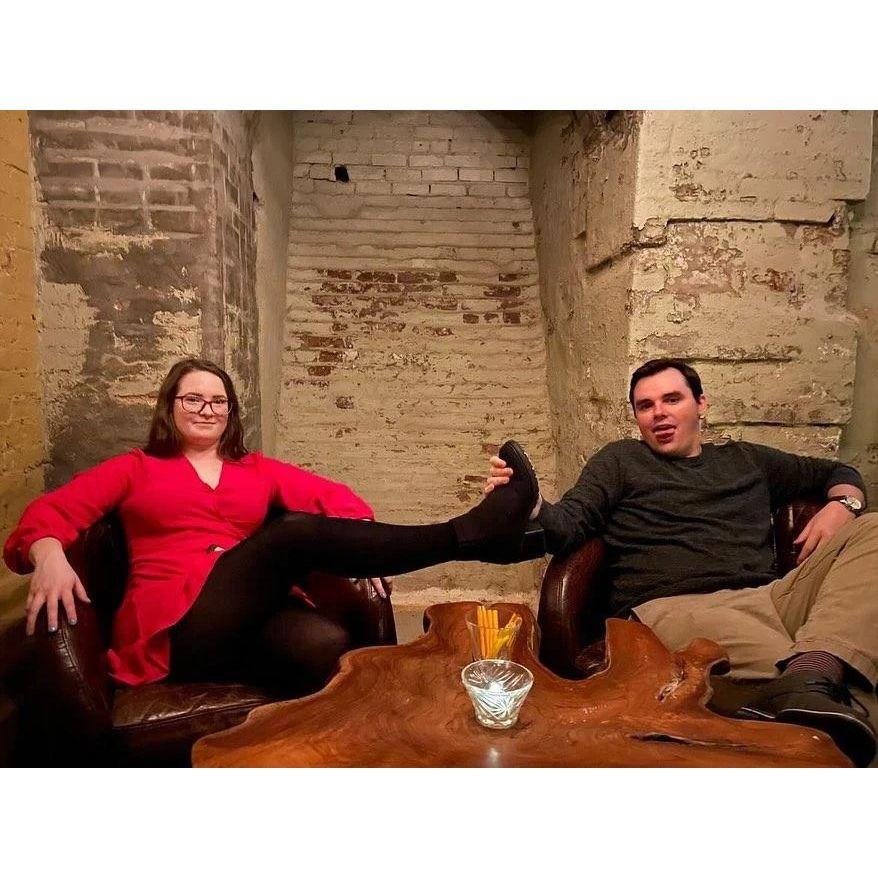 A lovely photo of us being silly at a nice cocktail bar.