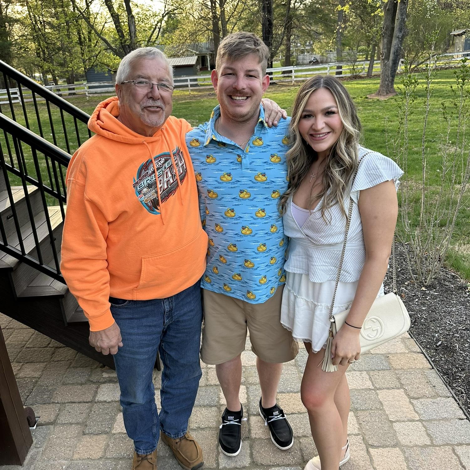 Father of the Groom.

In loving memory of Lori J. Exley, beloved mother of the groom.