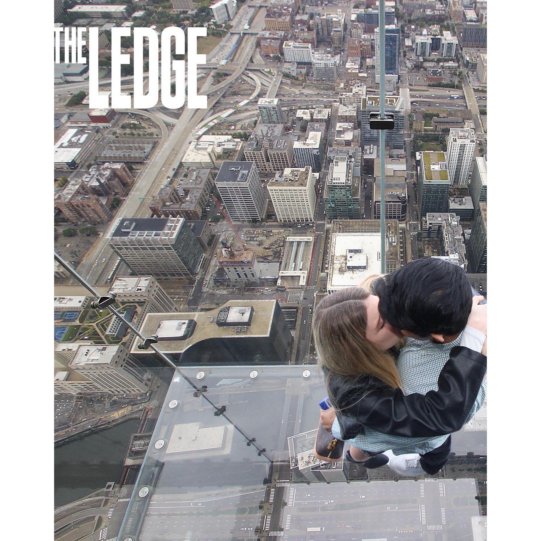 Our Engagement on the sky deck of the Willis Tower in Chicago