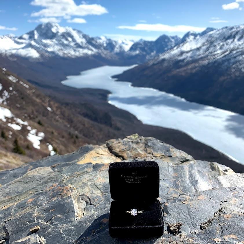 Engagement at the top of Twin Peaks trail! Eklutna lake in the background. About 30 minutes from our house.