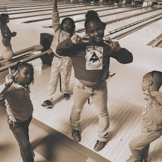 bowling strikes and sibling bonds: our family rolls as one!